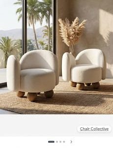 Modern white barrel chair with wooden ball legs